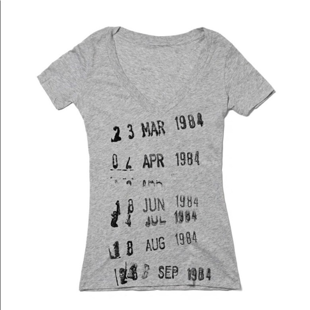 Out of Print Library Book Tee